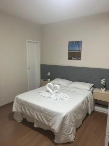 Una cama o camas en una habitación de Hotel Treviso