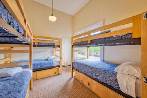 a room with three bunk beds in a house at HI San Francisco Fisherman's Wharf Hostel in San Francisco