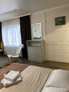 Postelja oz. postelje v sobi nastanitve Guest house Shulc