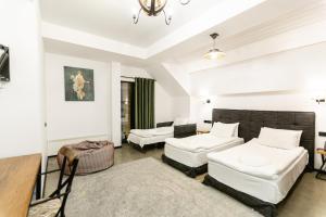 Hotel Roshe Gudauri客房内的一张或多张床位