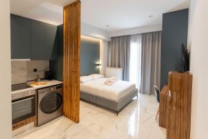 Ένα ή περισσότερα κρεβάτια σε δωμάτιο στο Δ17 Suites & Apartments