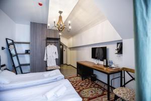 Hotel Roshe Gudauri客房内的一张或多张床位