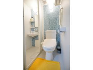 a bathroom with a white toilet and a sink at Uji Tea Inn - Vacation STAY 27198v in Uji