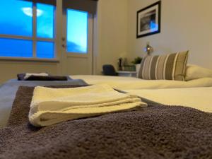 Letto o letti in una camera di Guesthouse Carina