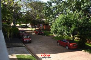 a group of cars parked on the side of a street at Ideas Temporarios in Paso de los Libres