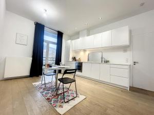 Nhà bếp/bếp nhỏ tại Cosy Apartment Brussels - Cinquantenaire
