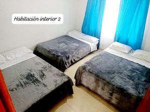 Ένα ή περισσότερα κρεβάτια σε δωμάτιο στο Mirador La Gloria