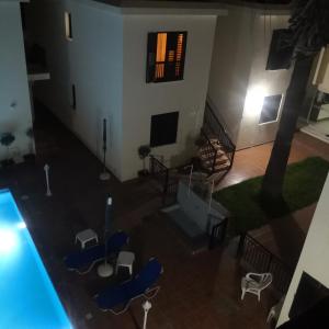 an aerial view of a living room with a pool at Seashell Apartments in Paphos City