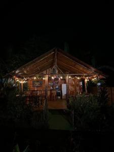 a tent with lights on it at night at Cabañas SyC in Fortuna