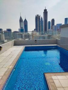 Swimmingpoolen hos eller tæt på Burj Khalifa view/ Cozy apartment
