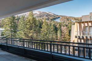 a balcony with a view of a mountain at HH apartments in Bjelašnica