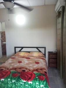 En eller flere senge i et værelse på Hostal EL VALLE
