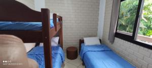 Postel nebo postele na pokoji v ubytování Residencial e Pousada Acauan + 15 fotografií
