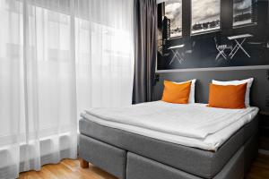 Postel nebo postele na pokoji v ubytování Aiden by Best Western Stockholm City