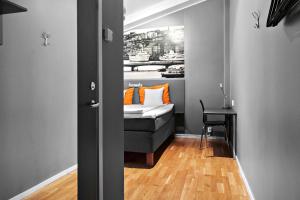 Postel nebo postele na pokoji v ubytování Aiden by Best Western Stockholm City