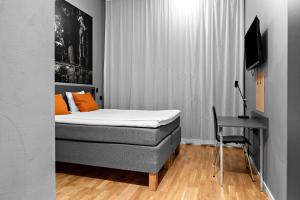 Postel nebo postele na pokoji v ubytování Aiden by Best Western Stockholm City
