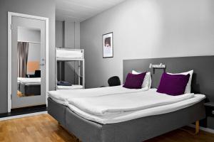 Postel nebo postele na pokoji v ubytování Aiden by Best Western Stockholm City