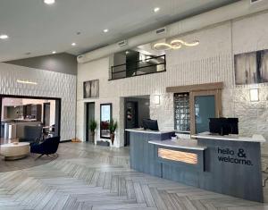 a lobby of a hotel with a reception desk at Best Western Carlisle South in Carlisle