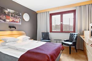 Кровать или кровати в номере Hotell Heden - BW Signature Collection