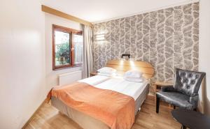 Кровать или кровати в номере Hotell Heden - BW Signature Collection