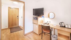 Телевизор и/или развлекательный центр в Hotell Heden - BW Signature Collection