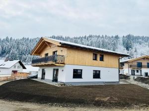 a house with a balcony on the side of it at Chalet in Hermagor near Nassfeld ski area in Hermagor
