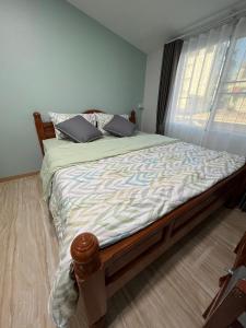 Cama o camas de una habitación en No.9 Bang Khun Non