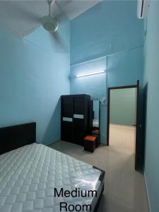 Katil atau katil-katil dalam bilik di S&S Homestay Segamat