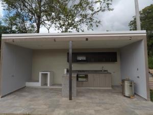 a large garage with a kitchen in it at Finca terraviva in Moniquirá