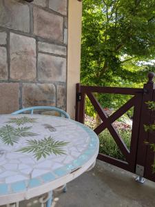 Balkón nebo terasa v ubytování Cottage in Uraidla