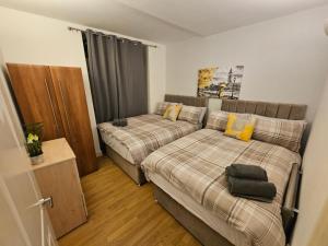 Ліжко або ліжка в номері 2bdr Islington close to station