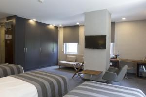 TV a/nebo společenská místnost v ubytování Modus Hotel Istanbul