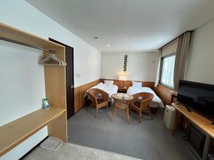 Katil atau katil-katil dalam bilik di Niseko Pension Bellary