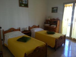 Кровать или кровати в номере Villa Miriam
