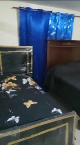 Cama o camas de una habitación en Recidencial Albolera