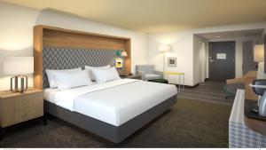Posteľ alebo postele v izbe v ubytovaní Holiday Inn & Suites Richmond West End
