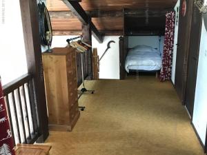 a room with a bed and a desk in a room at Chalet Les Orres, 4 pièces, 11 personnes - FR-1-322-581 in Les Orres