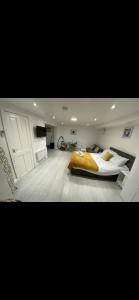 a bedroom with a large bed in a room at St James Apartments in Leeds