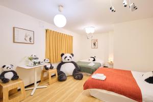 Postel nebo postele na pokoji v ubytování TORA HOTEL Tokyo Ueno 寅ホテル 上野 A