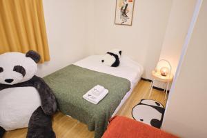 Postel nebo postele na pokoji v ubytování TORA HOTEL Tokyo Ueno 寅ホテル 上野 A