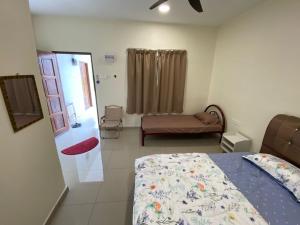 Postel nebo postele na pokoji v ubytování D’solok chalet + 3 fotografie