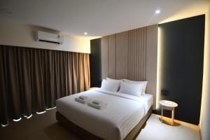Alto Hotel M客房内的一张或多张床位