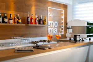 Köök või kööginurk majutusasutuses Moma Hotel Wellness & Spa