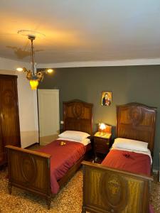 Un pat sau paturi într-o cameră la Lions Venice Guest house
