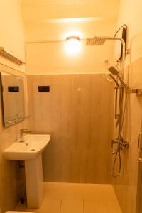 Een badkamer bij Omega Villa
