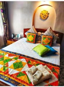 Postel nebo postele na pokoji v ubytování Mysa Homestays