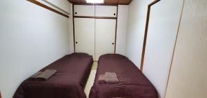 Ένα ή περισσότερα κρεβάτια σε δωμάτιο στο 札幌市中心部大通公園まで徒歩十分観光移動に便利なロケーションh203#2