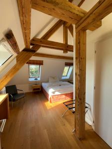 Postel nebo postele na pokoji v ubytování Parkforum Wylihof