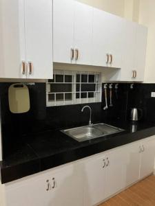 Kuchyň nebo kuchyňský kout v ubytování ESTILO APARTMENT 2-storey