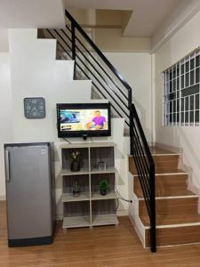 TV a/nebo společenská místnost v ubytování ESTILO APARTMENT 2-storey